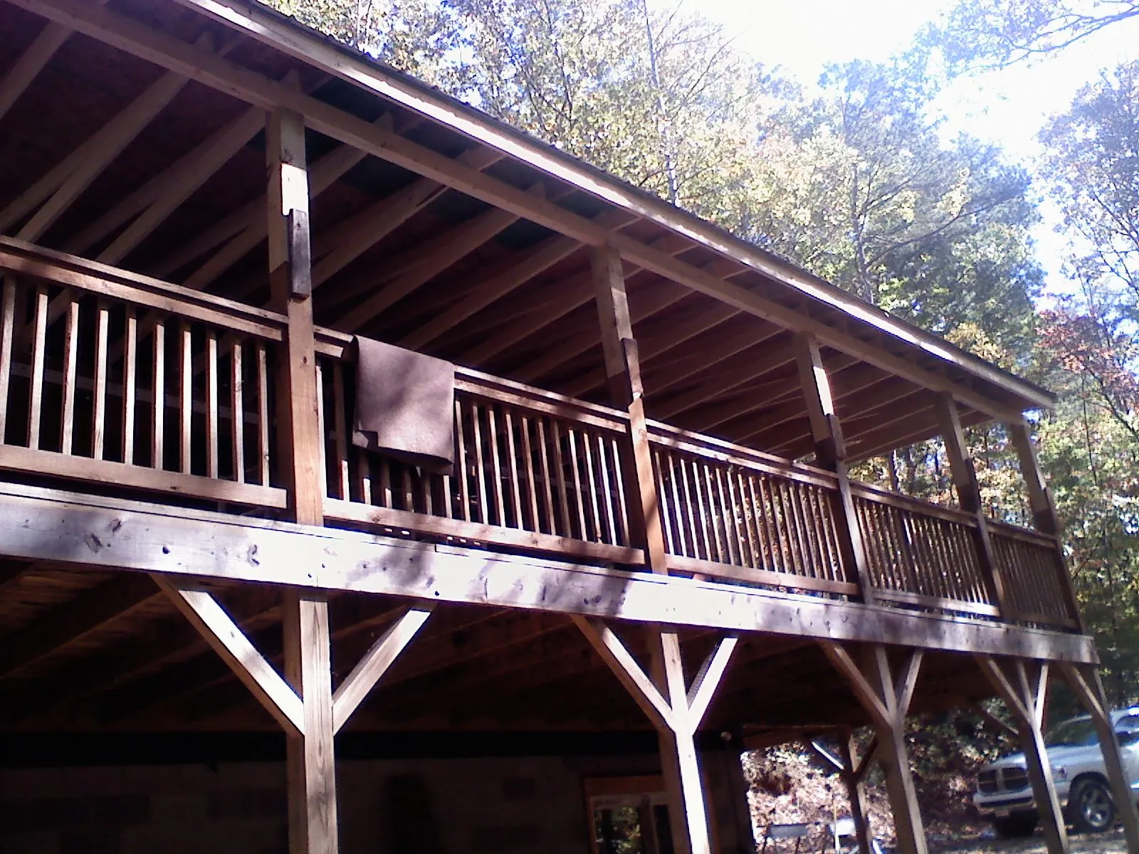 Timber framing under a new elevated porch and deck — Roof Leak Repair in New Lexington by Roofing Brothers